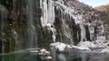 The waterfall in the Dashbashi gorge in winter, Georgia