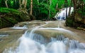 Waterfall in deep tropical forest at Erawan National Park Royalty Free Stock Photo