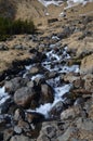 Waterfall Down the Side of a Mountain as the Snow Melts Royalty Free Stock Photo