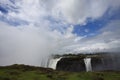 Waterfall, clouds and sky