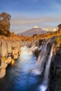 Waterfall. Fall foliage in autumn season and Mountain Fuji near Royalty Free Stock Photo