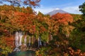 Waterfall. Fall foliage in autumn season and Mountain Fuji near Royalty Free Stock Photo