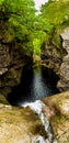 Waterfall Falls Of Foyers In Narrow Gorge With Old Stone Bridge At Loch Ness In Scotland