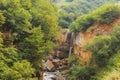 Waterfall flowing into the river Gudialchay.Guba.Griz village.Azerbaijan Royalty Free Stock Photo