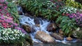 Scenic waterfall surrounded by flowers