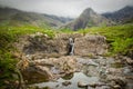 Waterfall at the foot of the mountain at the Fairy Pools on the Isle of Skye in Scotland Royalty Free Stock Photo