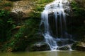 Waterfall in forest autumn view