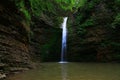 Waterfall in forest autumn view