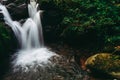 Waterfall in the forest or motion of water at brook of water fall. with tree leaf and stone rock. at Spun or Span Nan province, Royalty Free Stock Photo