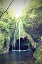 Waterfall in the forest with sun light Royalty Free Stock Photo