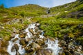 Waterfall in the Geiranger valley near Dalsnibba mountain, Norway Royalty Free Stock Photo