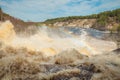 At the waterfall Girvas, Karelia. Russia. Spring