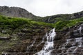 Waterfall in Glacier National Park, USA Royalty Free Stock Photo
