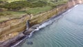 Waterfall on Golovinsky Cliff on Kunashir Island, Kuril Islands, Russia. Aerial view Royalty Free Stock Photo