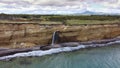 Waterfall on Golovinsky Cliff on Kunashir Island, Kuril Islands, Russia. Aerial view Royalty Free Stock Photo
