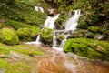 Waterfall with green moss.