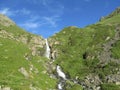 Waterfall in green mountains Royalty Free Stock Photo