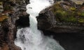 Waterfall of Gudbrandsjuvet gorge in Valldola valley on Trollstigen route in snow in Norway Royalty Free Stock Photo