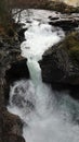 Waterfall of Gudbrandsjuvet gorge in Valldola valley on Trollstigen route in snow in Norway Royalty Free Stock Photo