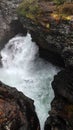 Waterfall of Gudbrandsjuvet gorge in Valldola valley on Trollstigen route in snow in Norway Royalty Free Stock Photo