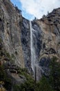 Waterfall from the high gray rocks in Yosemeti national park