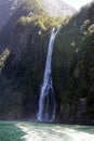 Waterfall in the Hollyford Valley in Fiorland National Park, New Zealand Royalty Free Stock Photo