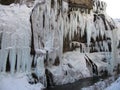 Waterfall with huge beautiful icicles hanging from the rocks