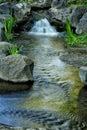 A small waterfall in a Japanese style garden Royalty Free Stock Photo