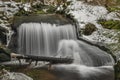 Waterfall on Jezerni creek in spring in national park Sumava in Czech republic Royalty Free Stock Photo