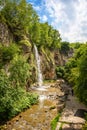Waterfall in Kislovodsk, Russia. Water falls into gorge, mountain landscape Royalty Free Stock Photo