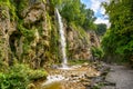 Waterfall in Kislovodsk, Russia. Water falls into gorge, mountain landscape
