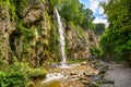 Waterfall in Kislovodsk, Russia. Water falls into gorge, mountain landscape Royalty Free Stock Photo