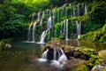 Waterfall landscape. Beautiful hidden waterfall in tropical rainforest. Nature background. Slow shutter speed, motion photography Royalty Free Stock Photo