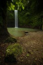 Waterfall landscape. Beautiful hidden waterfall in tropical rainforest. Nature background. Slow shutter speed  motion photography Royalty Free Stock Photo