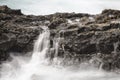 Waterfall And Lava Coastline Long Exposure, La Palma Royalty Free Stock Photo