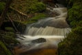 Waterfall on Lesni creek in Sumava national park in spring day Royalty Free Stock Photo