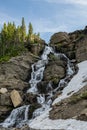 Waterfall in Logan Creek along Going to the Sun Road Royalty Free Stock Photo