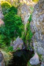 Waterfall in Manteigas Town, Serra da Estrela or Mountain of Star in Portugal called Poco do Inferno or Hell Pit