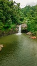 Waterfall in the middle of the forest. Bird eye view , drone Royalty Free Stock Photo