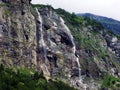 Waterfall Milchbachfall or Wasserfall MilchbachfÃÂ¤ll, MilchbÃÂ¤ch stream in the Alpine Valley of Maderanertal