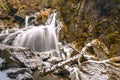 Waterfall moss snow icicles autumn water Royalty Free Stock Photo