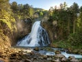 Waterfall with mossy rocks in Golling, Austria