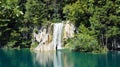 Waterfall and mountain, beautiful nature landscape, Plitvice Lakes in Croatia, National Park, sunny day Royalty Free Stock Photo