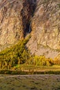 Waterfall in a mountain gorge. The confluence of the Karasu River into the Chulyshman River