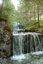 Waterfall at mountain hiking tour to Tegelberg mountain, Bavaria, Germany