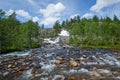 Waterfall on the mountain river in Norway. Royalty Free Stock Photo