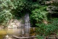 Waterfall, mountain and river in the tropical jungles in Gunung Mulu National park. Royalty Free Stock Photo