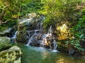 Waterfall and mountaina river in the Yanoda park, Hainan Royalty Free Stock Photo