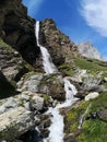 Waterfall in the mountains- Cervino Waterfall - Breuil-Cervinia, Italy Royalty Free Stock Photo