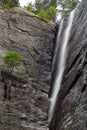 A waterfall in narrow crevice, Southern Norway Royalty Free Stock Photo